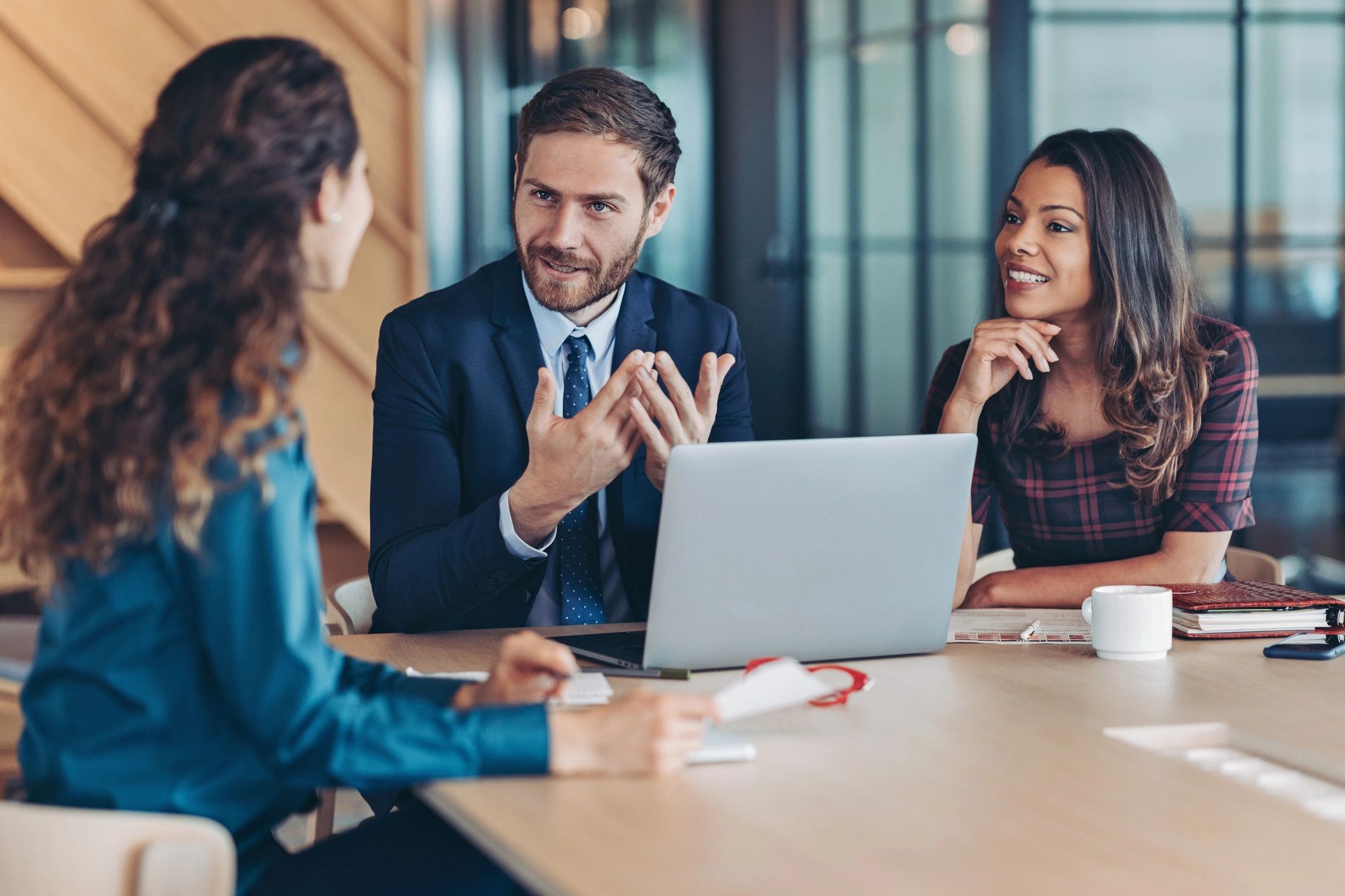 Insurance professionals meeting in a modern office