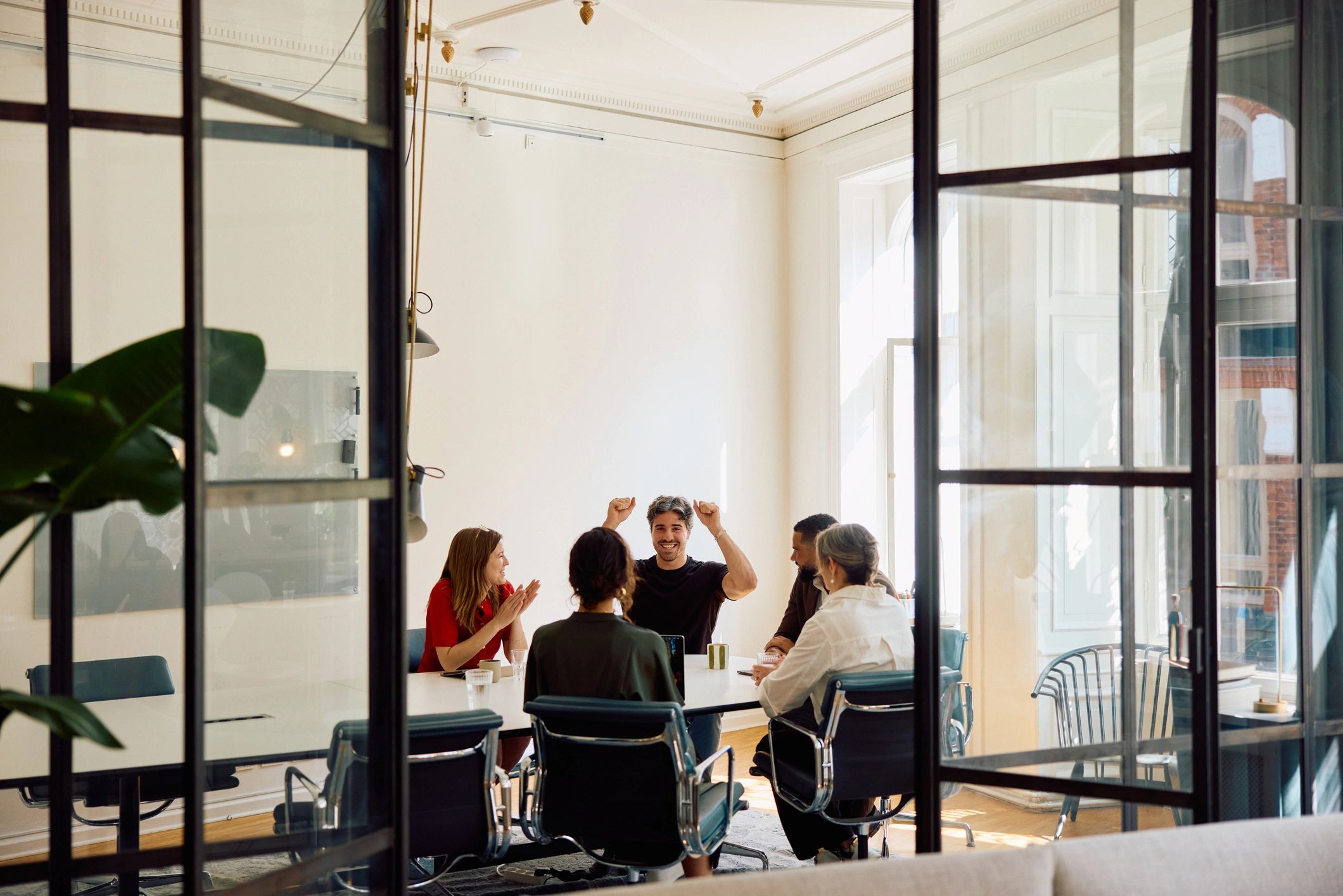 Insurance and business professionals meeting in a modern boardroom