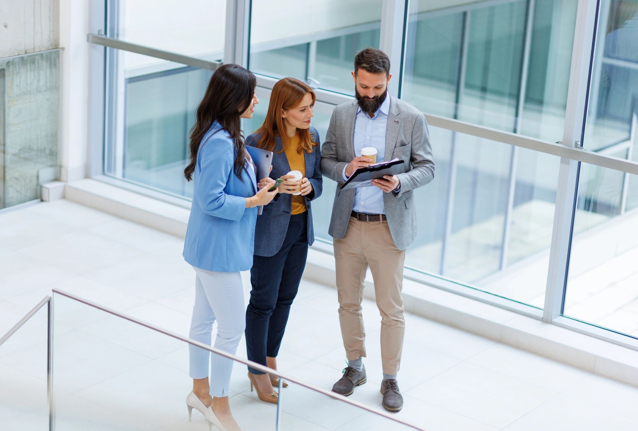 Insurance professionals collaborating in a modern office